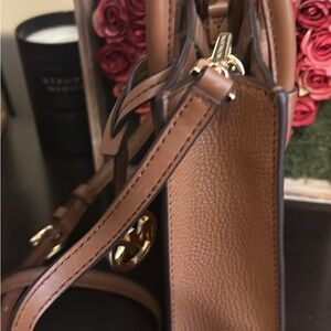 Micheal Kors Mercer Extra-Small Pebbled Leather Crossbody Bag.
